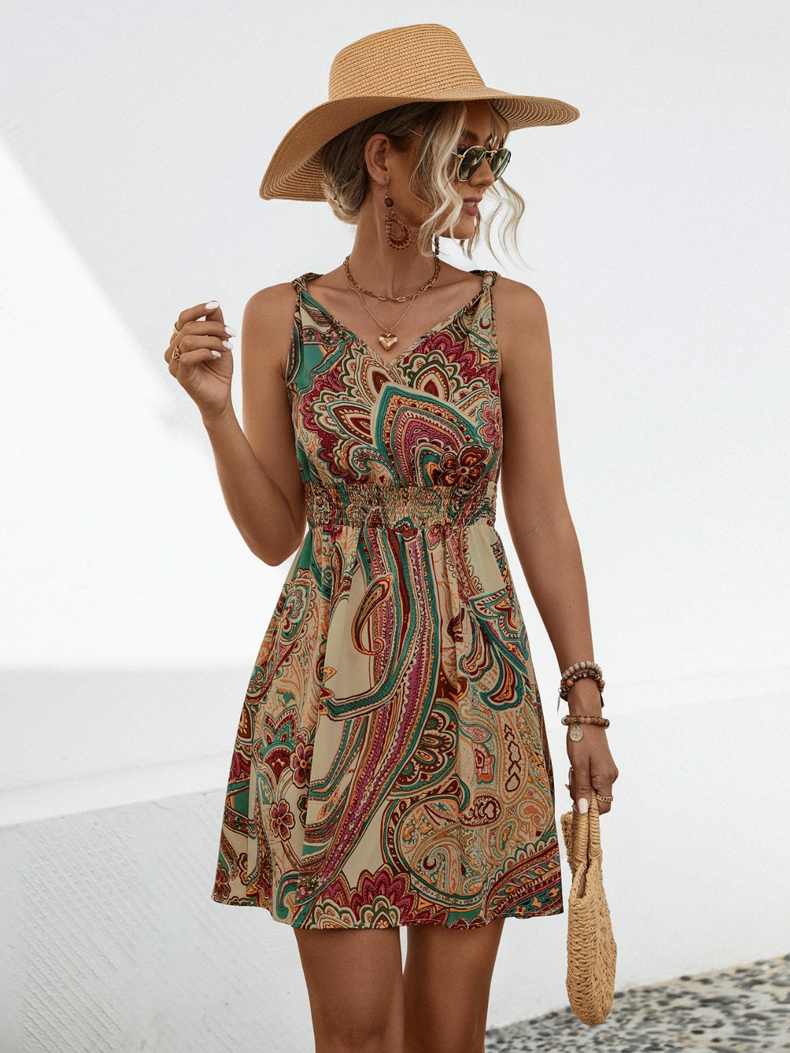 The There She Goes” Smocked Printed V-Neck Mini Dress