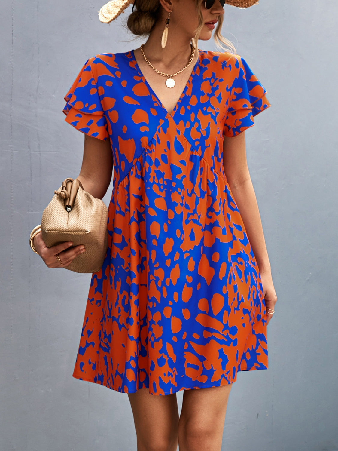 “The Protector” Ruffled Printed V-Neck Short Sleeve Mini Dress