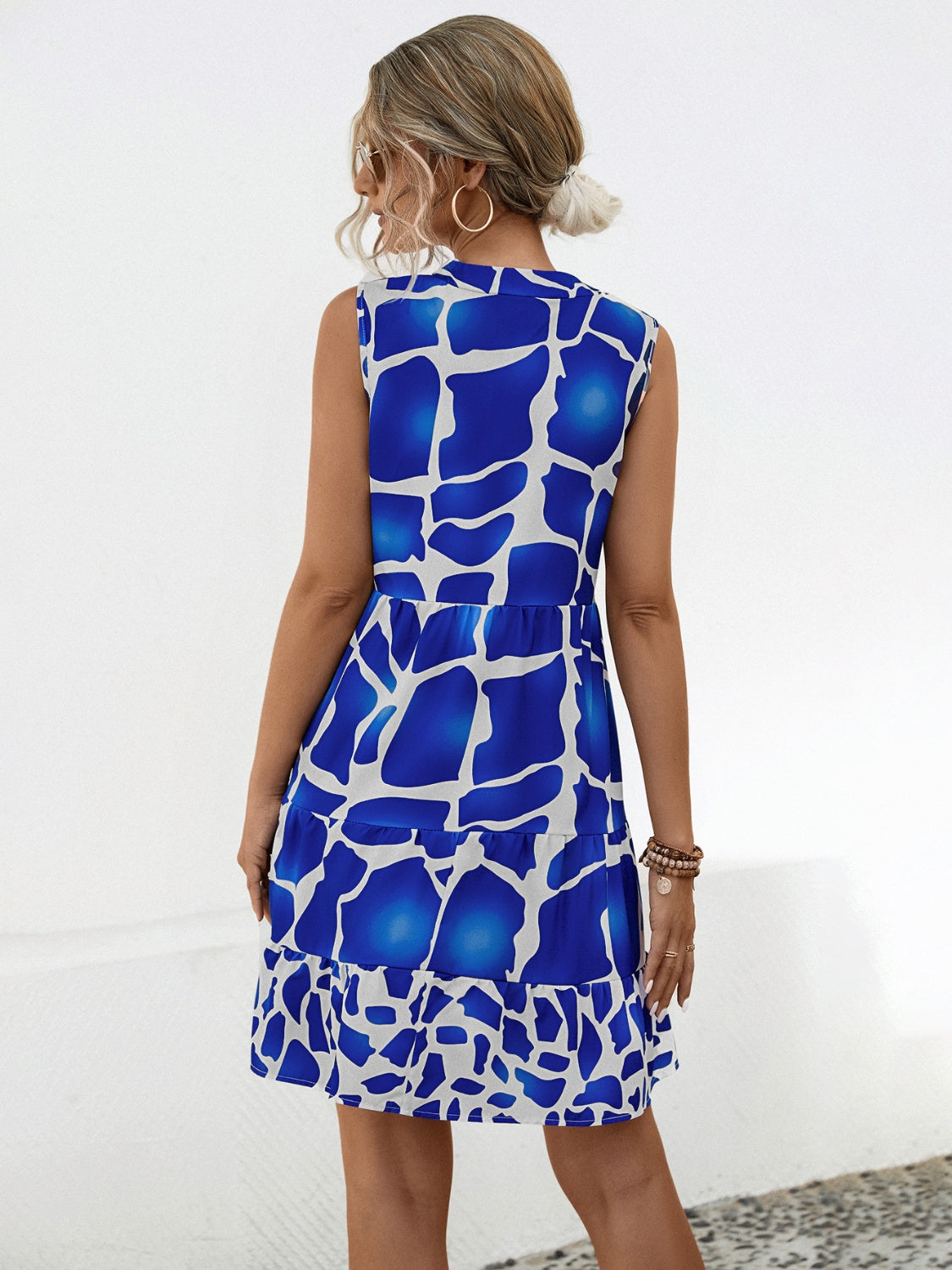 “The Vista Print” Printed Notched Sleeveless Tiered Dress