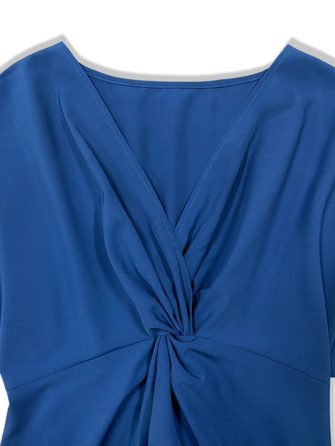 “The Blue Babe” Twisted High-Low Short Sleeve Blouse