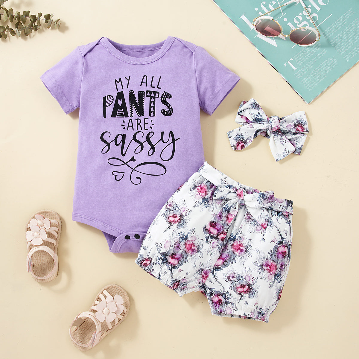 “Baby Brick:MY ALL PANTS ARE SASSY” Graphic Bodysuit and Floral Shorts Set