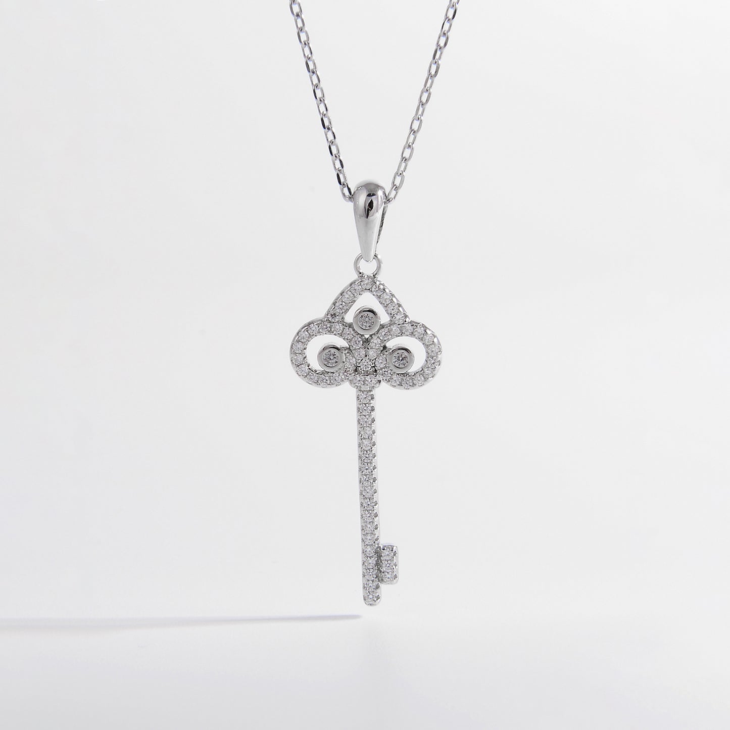 Brick Bling: 925 Sterling Silver Inlaid Zircon Key Shape Necklace