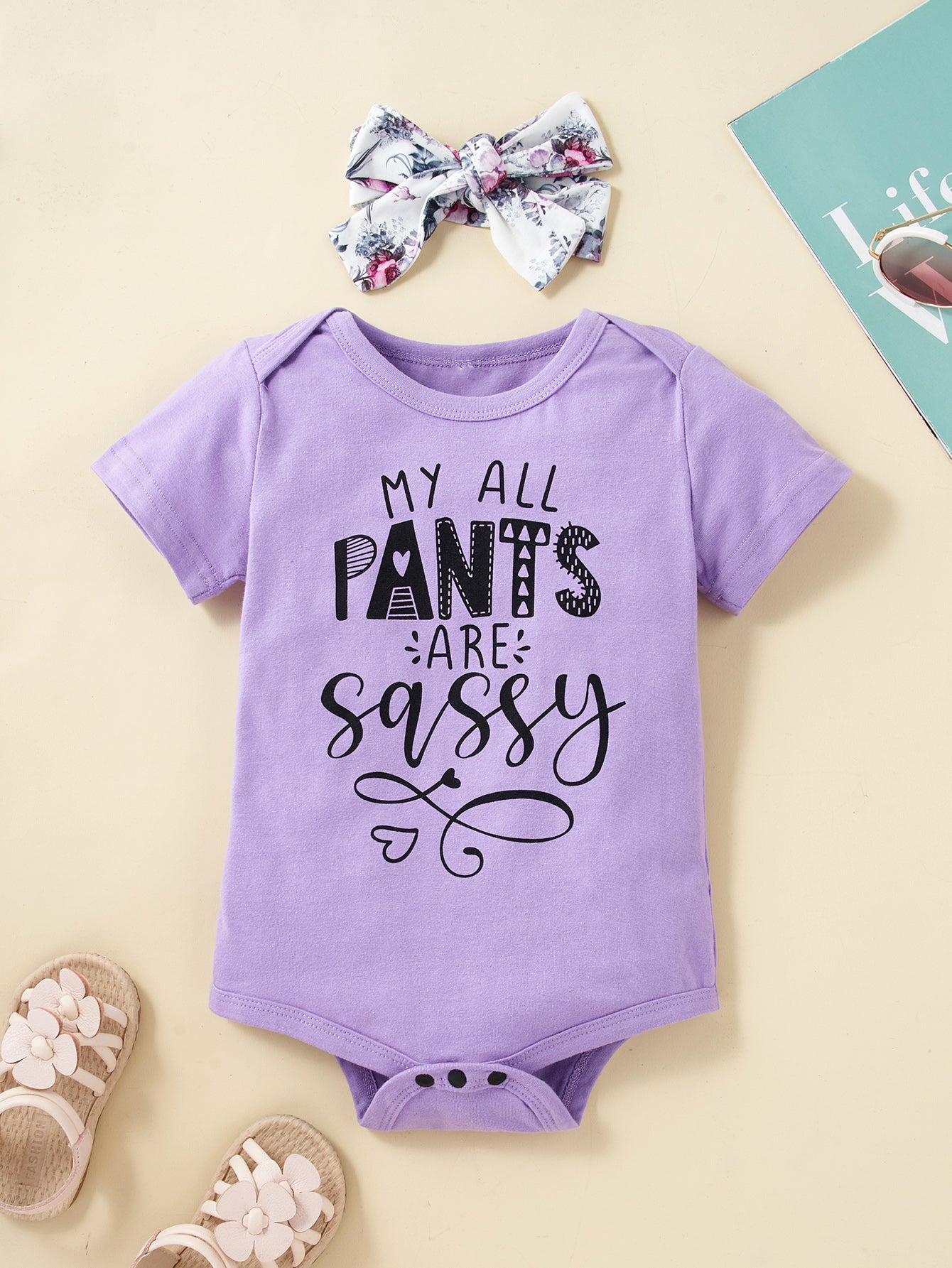 “Baby Brick:MY ALL PANTS ARE SASSY” Graphic Bodysuit and Floral Shorts Set